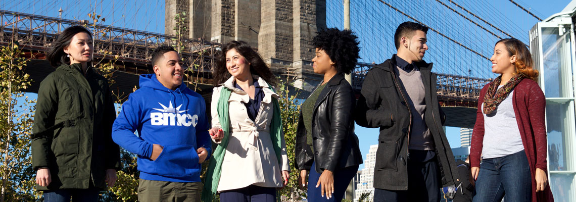 several students outside with Manhattan buildings in background; one student wearing a BLA tee shirt