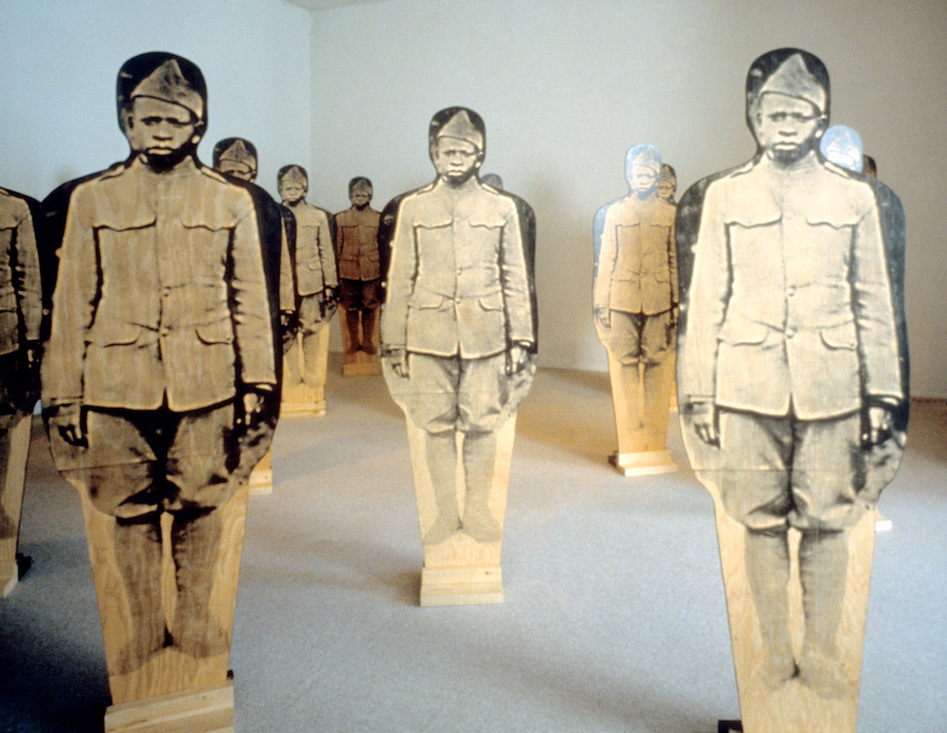 Mildred Howard, “In the Line of Fire,” 1996, Screen printing, plywood. Image courtesy of artist