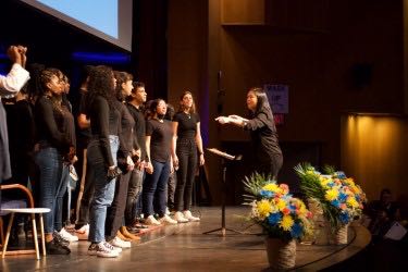 Music and Art Chair Eugenia Oi Yan Yau directed BMCC students in two choral pieces at the close of the April 4 event.