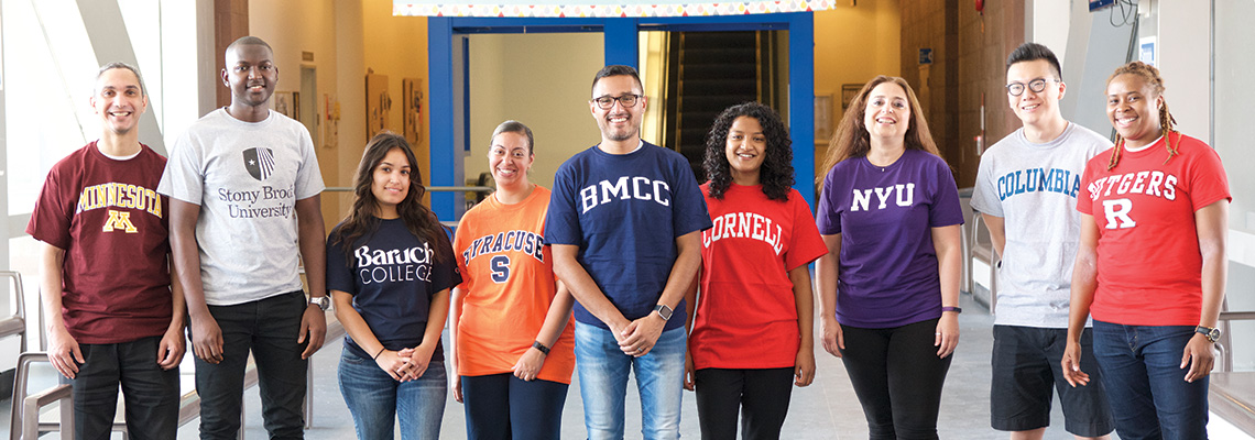 Students with shirts of different colleges