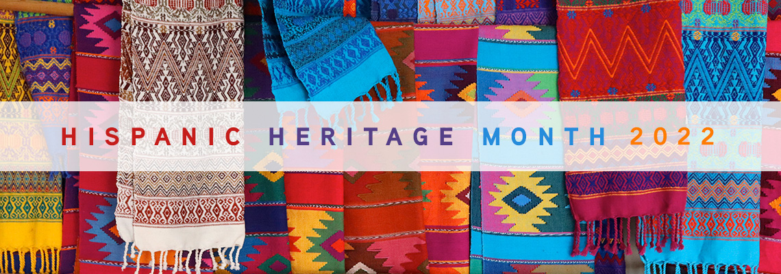 Hispanic Heritage Month 2022 words on colorful fabrics