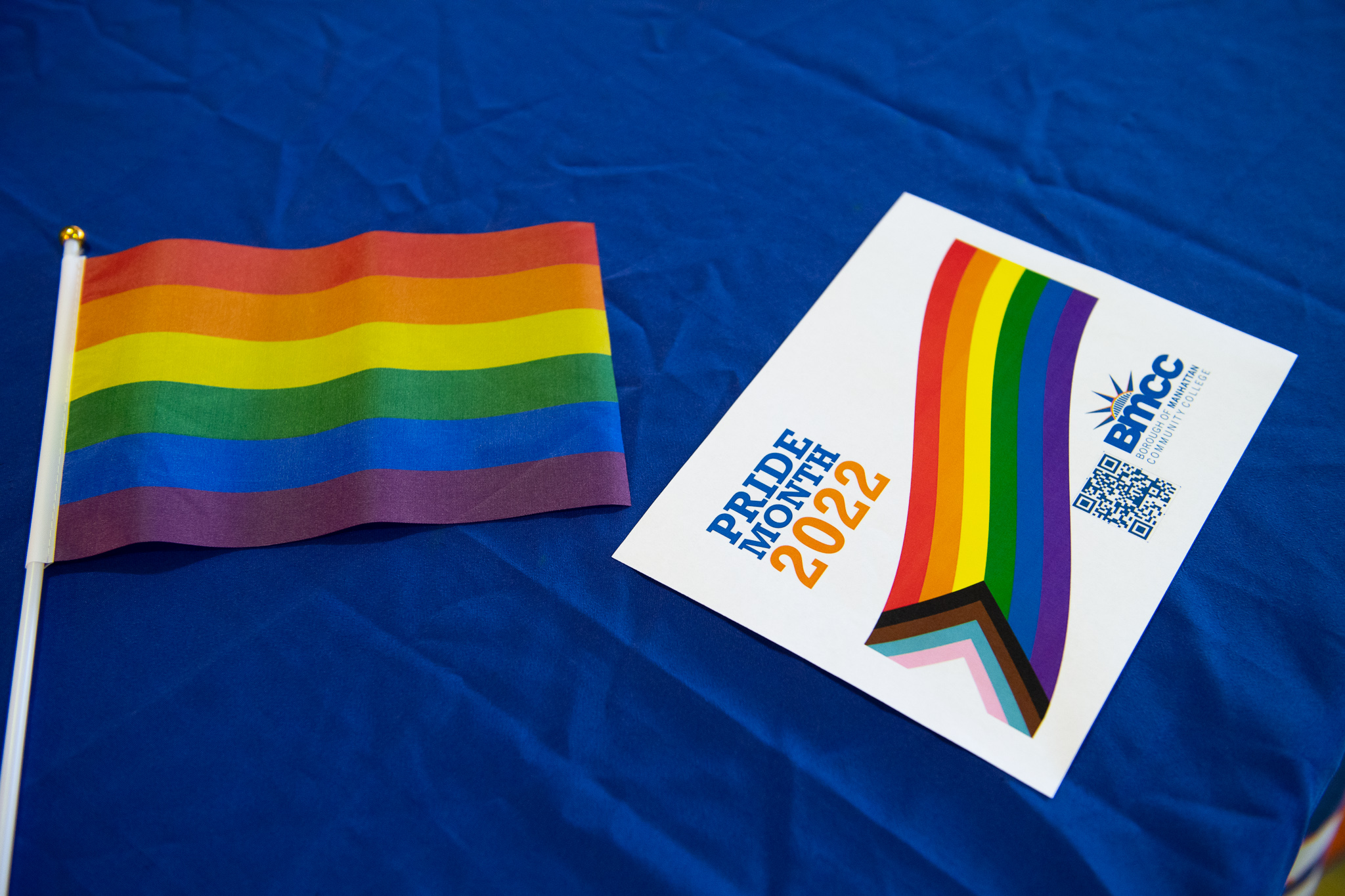 image of rainbow flag and Pride flyer