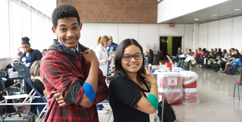 two students who have just donated blood at the blood drive