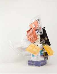 sculpture made of stacked household and office items