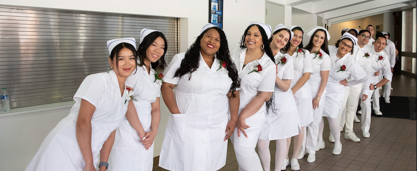 nurses lined up to receive degrees at pinning cermony