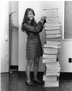 Margaret Hamilton with printouts of code she and her team created for Apollo space crafts