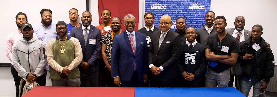 BMCC and Morehouse administrators and students at signing table