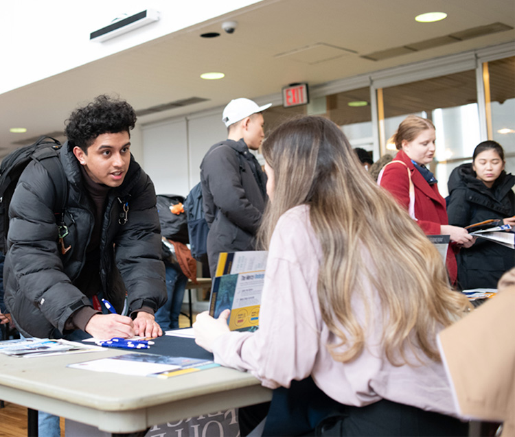 Prospective students at admissions fair