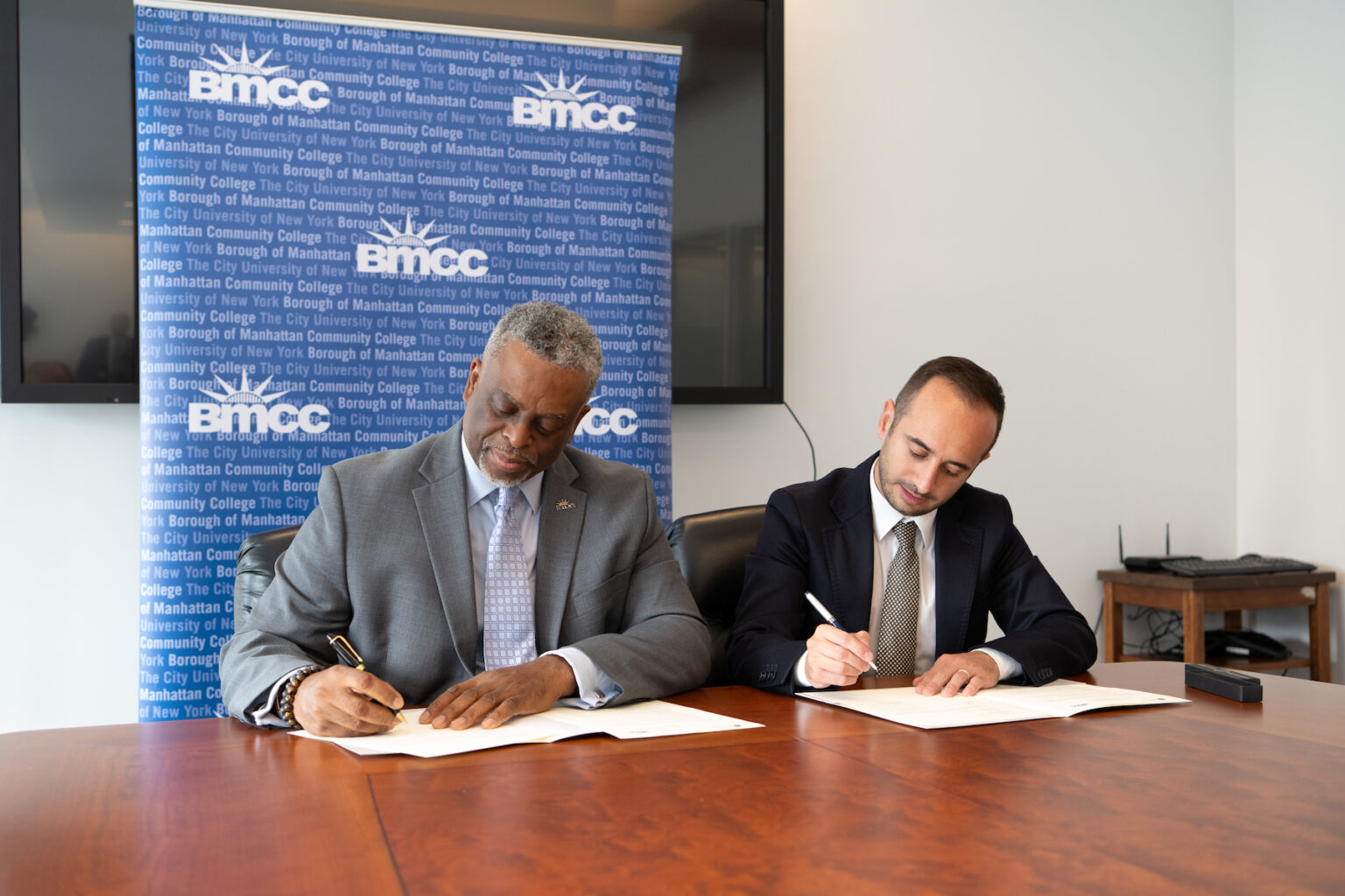 BMCC President Munroe and EDISU President Sciretti Sign Statement of