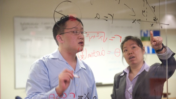 (Left to right) BMCC Student Howie Terrence Shi and Professor Lina Wu