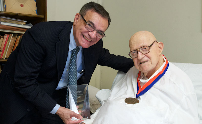 President Antonio Perez presented Herbert Rosenfied with an award with deep appreciation for his leadership in the establishment of the BMCC Foundation and for his generosity in creating The Abner B. Rosenfield Fund for Outstanding Scholarship and Citizenship 2015. Mr. Rosenfield is wearing the Presidential Medal of Honor that was presented to him in 1984.
