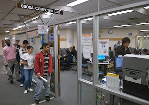 <b>Students wait on line to use the computer lab at B.M.C.C. There is not enough money to rebuild the college's Fiterman Hall, which was damaged on 9/11.</b>