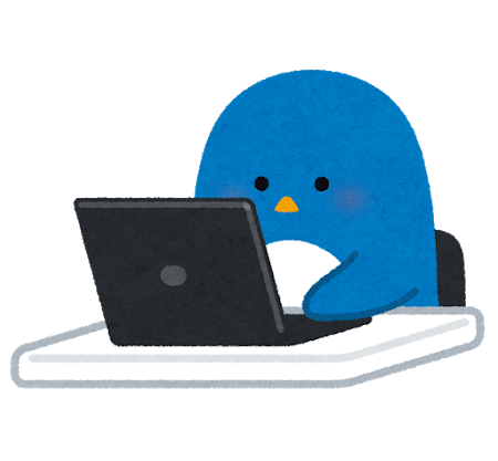 Cute blue penguin sitting at a laptop